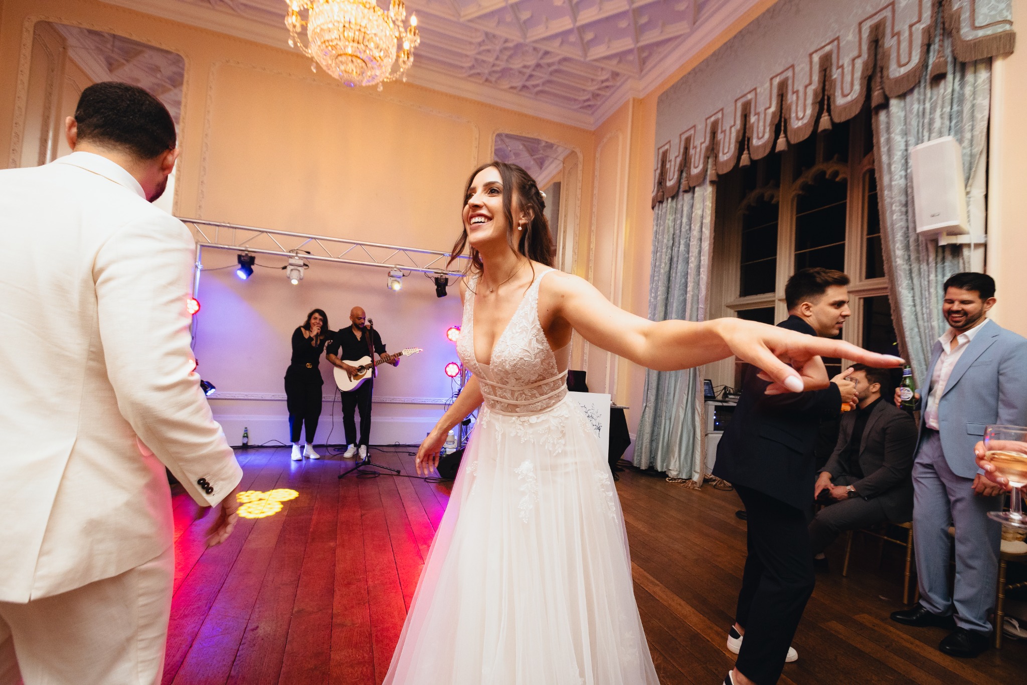 Live music building energy on the dancefloor at an Azoos Events celebration